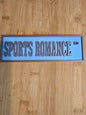 Shelf Sign - Sports Romance Rd